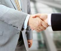 two business people shaking hands