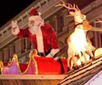santa waves in parade