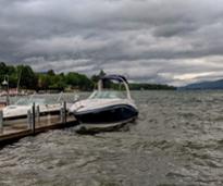 boat docked in what looks like stormy weather coming