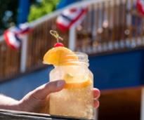 person holding an ice cold beverage