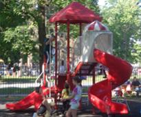 kids playing on the playground at the track