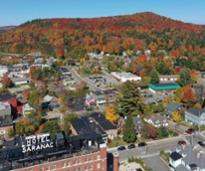 trees with fall colors above Saranac Lake