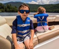 kids on a boat
