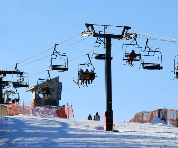 skiers on chairlift