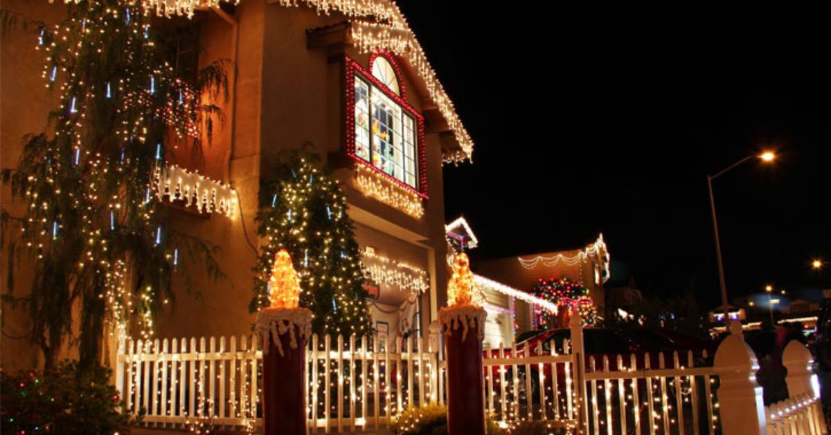 house with christmas lights outside it