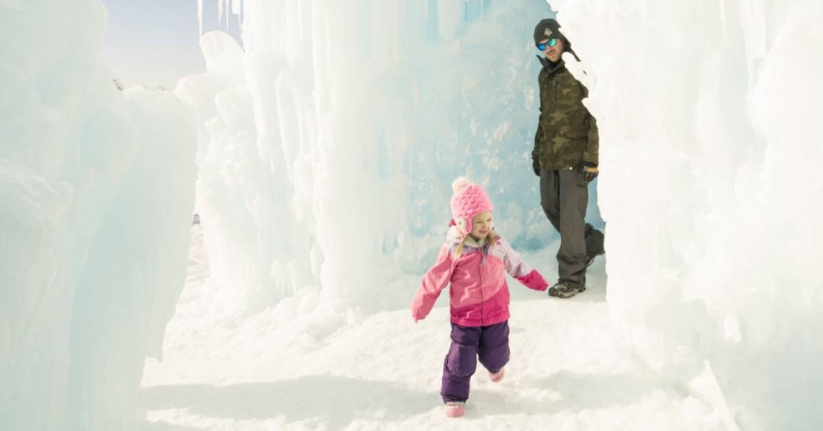 girl and dad at ice castles attraction