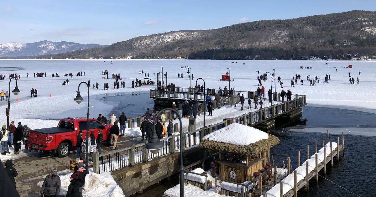 winter carnival scene on frozen lake