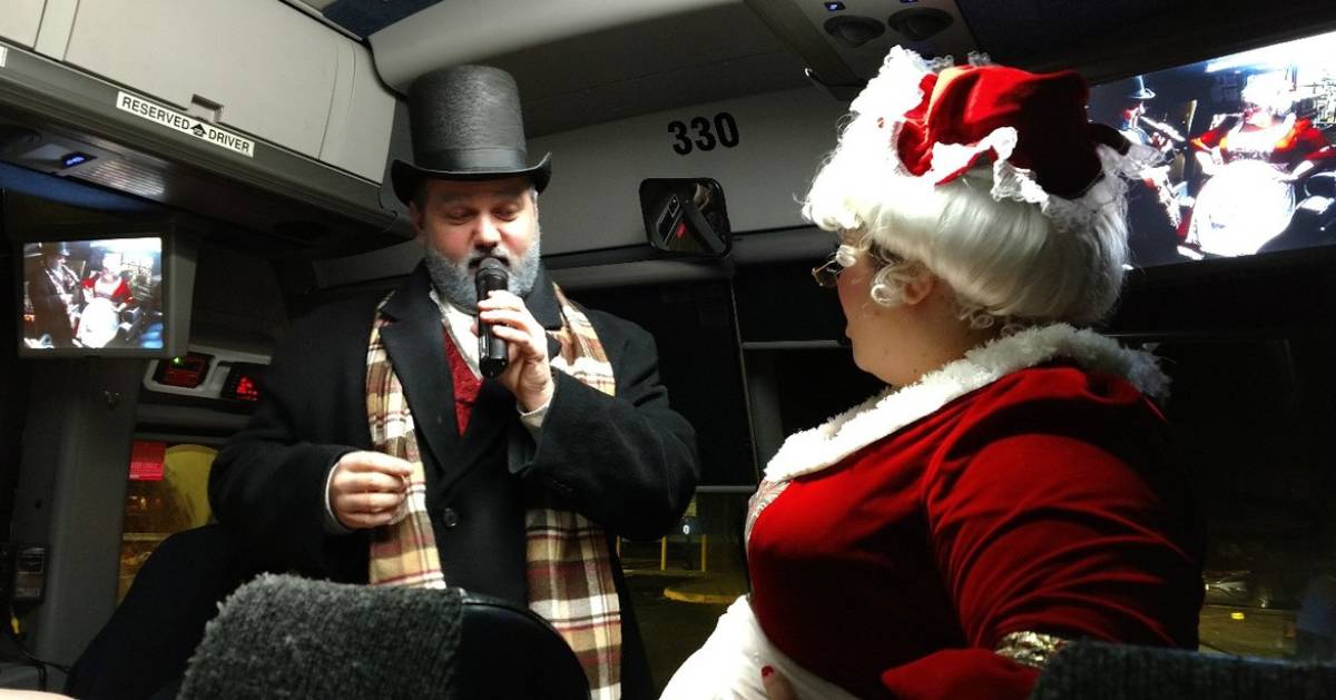 Scrooge and Mrs. Claus on a bus