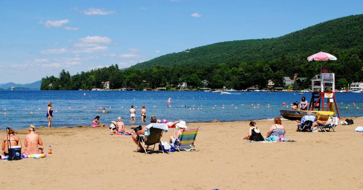 scene with people in water at beach