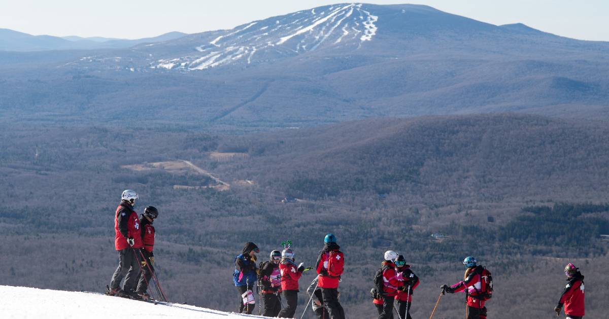 skiers on a mountain