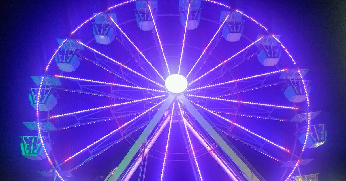 purple ferris wheel at night