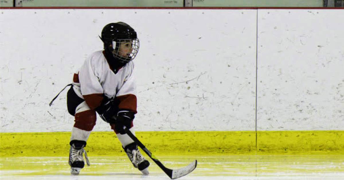 boy in hockey gear
