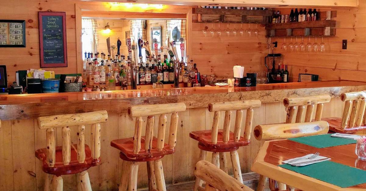 bar area with wooden panels