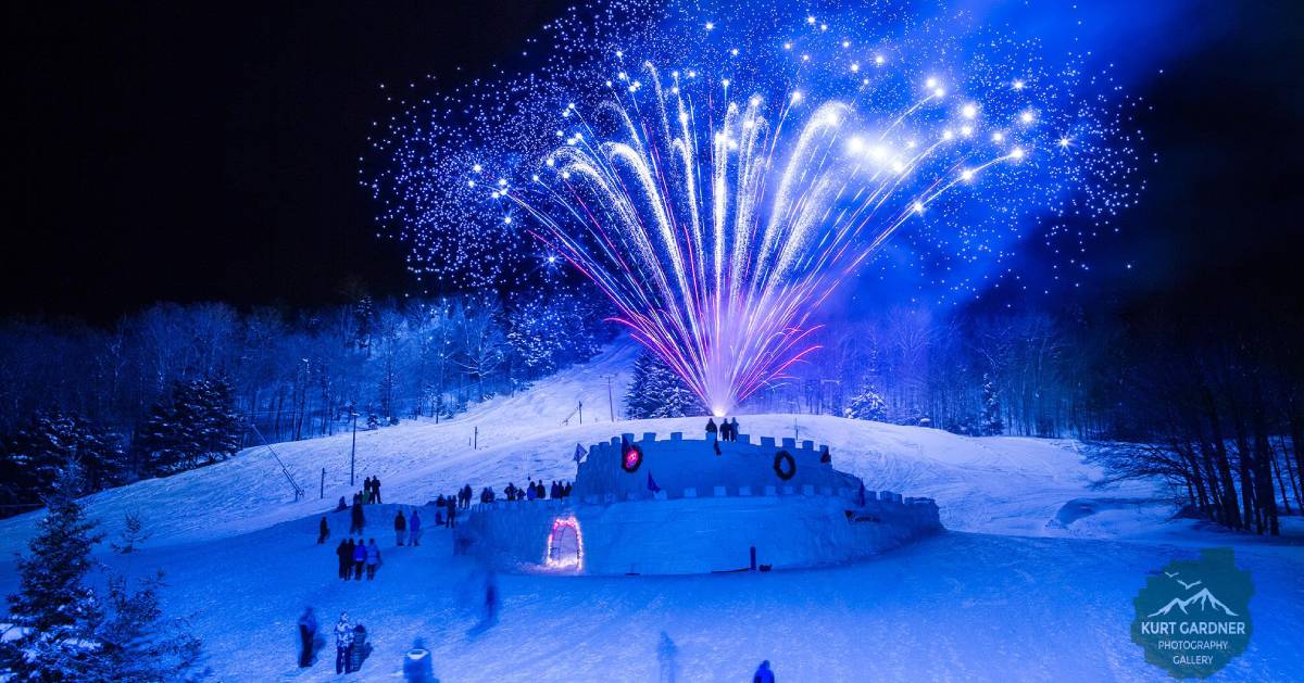 blue fireworks over winter carnival