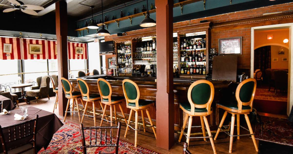 tavern and bar area with wooden stools