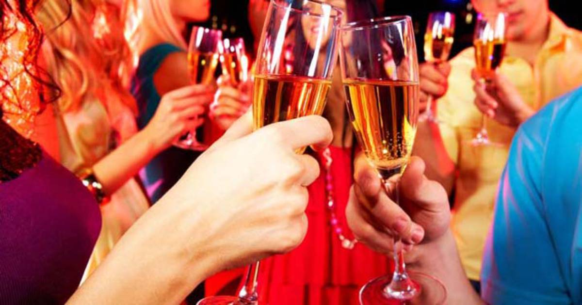 people holding champagne flutes