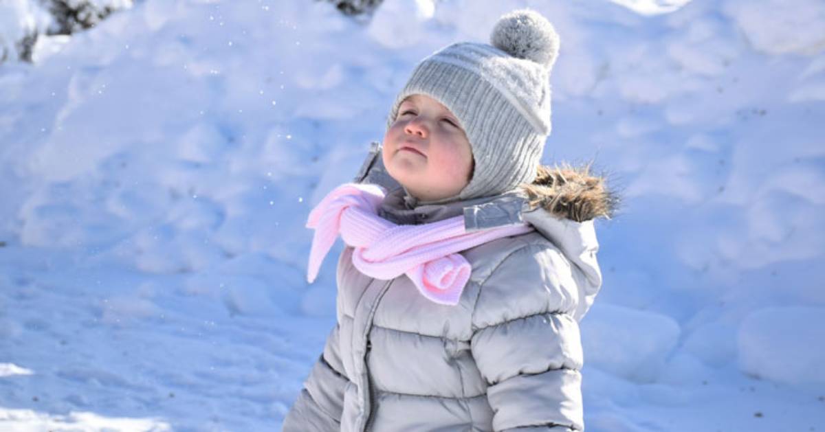 girl breathing in winter air