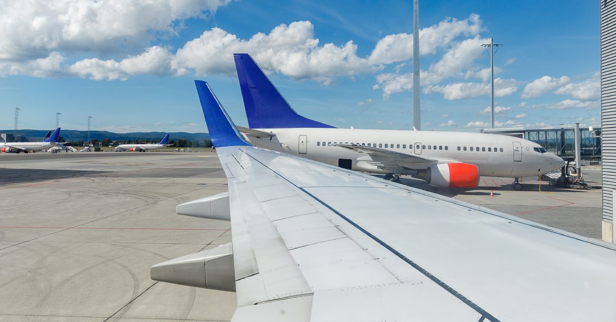 planes on the tarmac at an airport