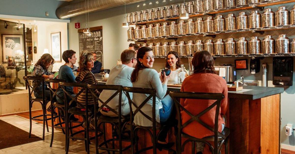 people at a tea tasting bar