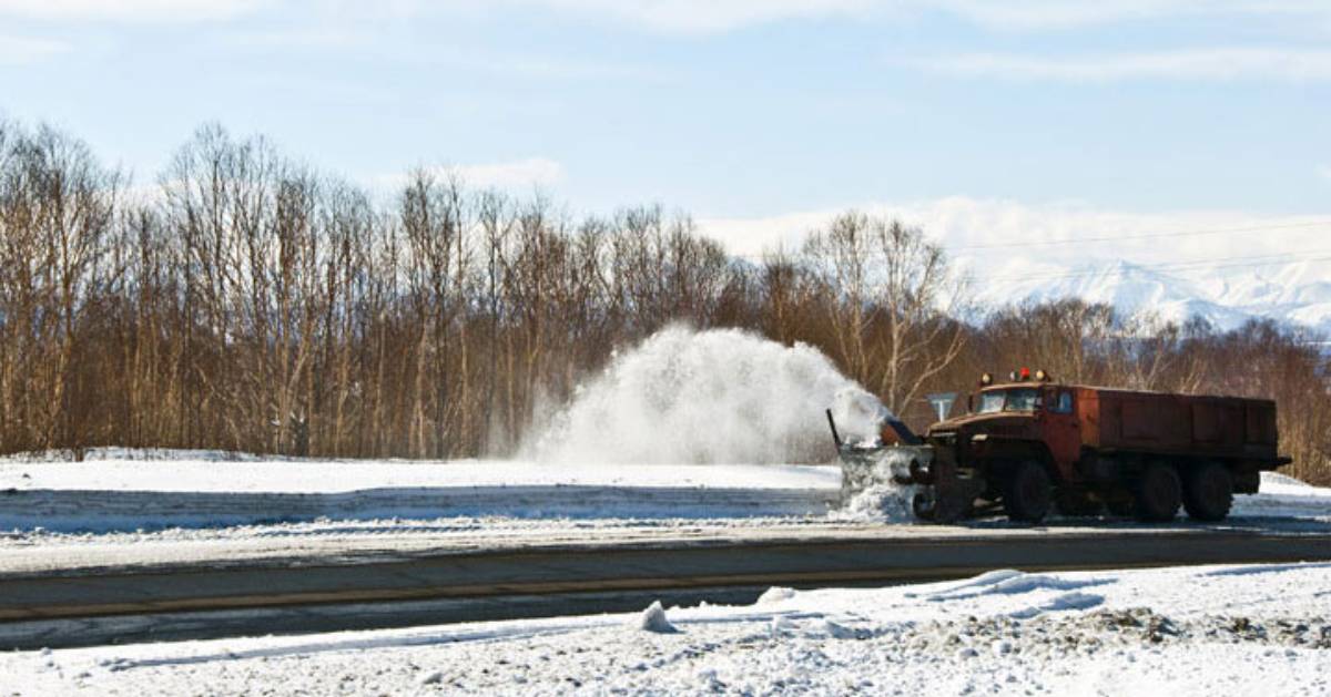 snow plow on road