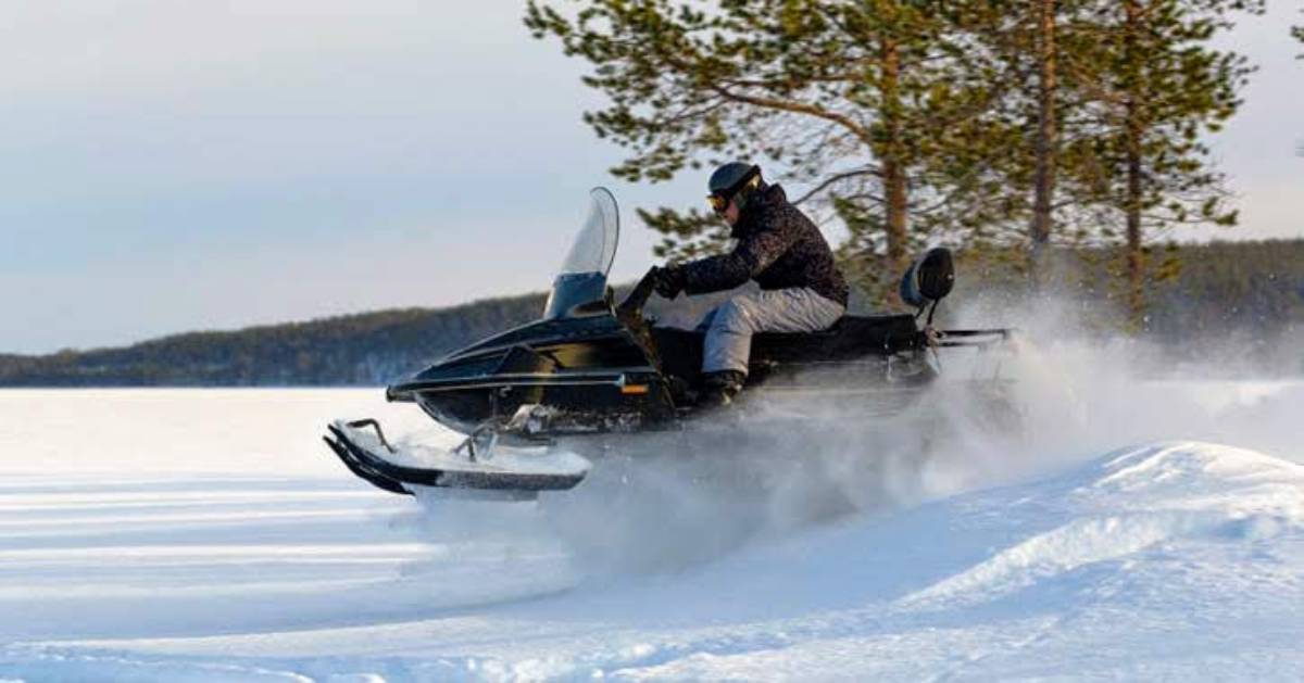 man on snowmobile