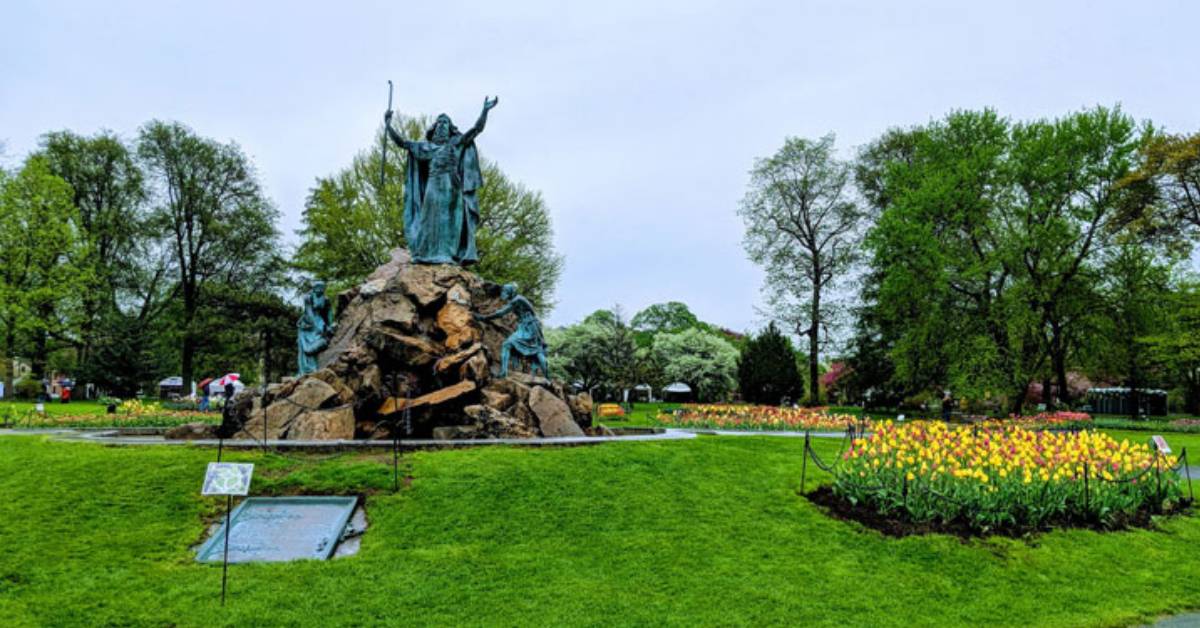 statue and tulips in Washington Park