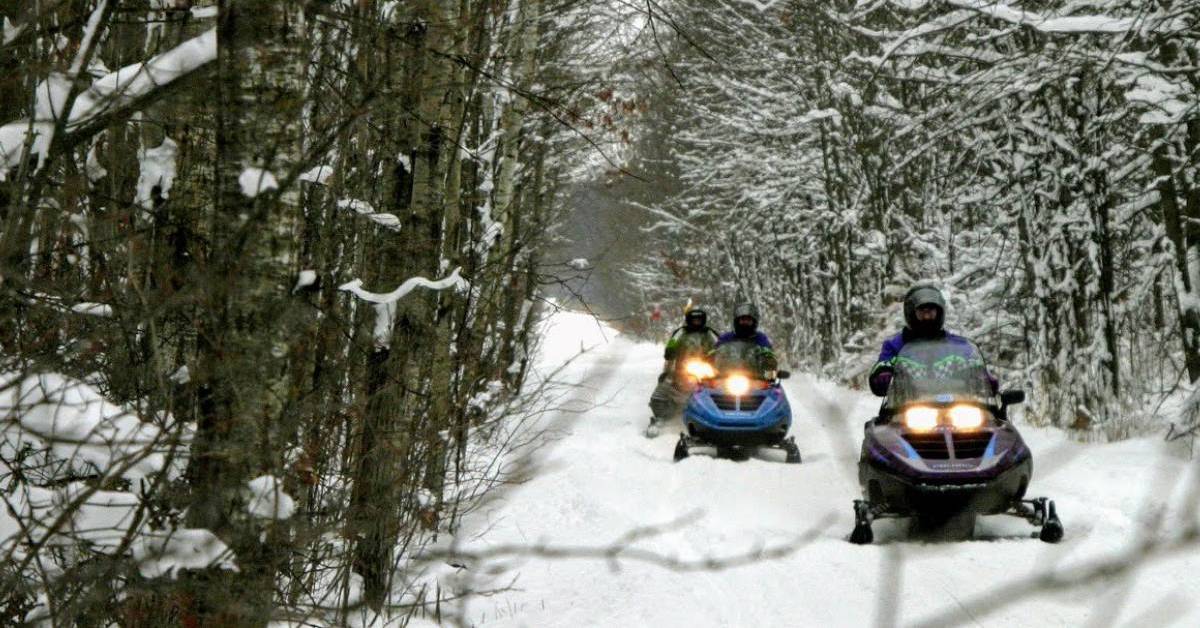 Rev Up Your Winter With a Snowmobile Adventure Near Lake