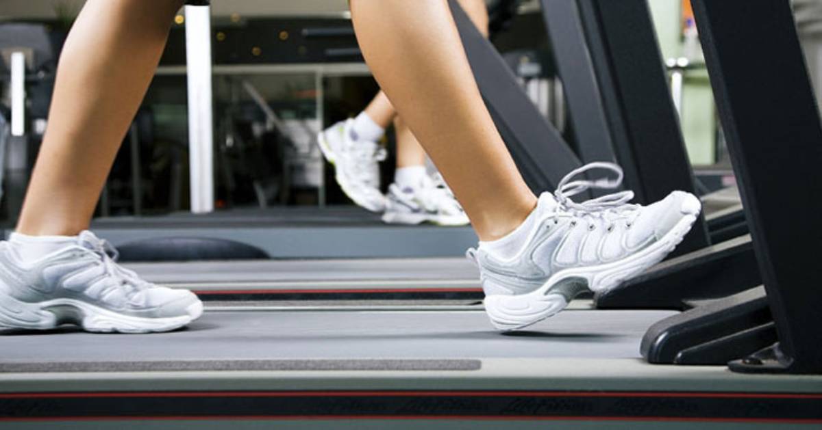 person walking on treadmill