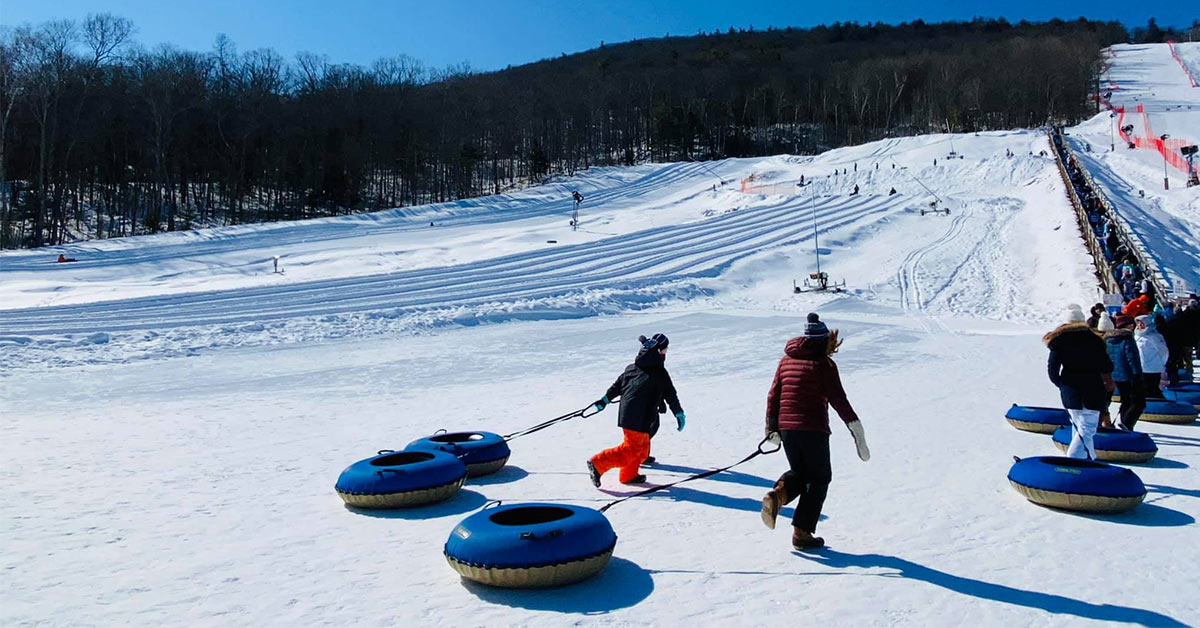 people tubing at west mountain