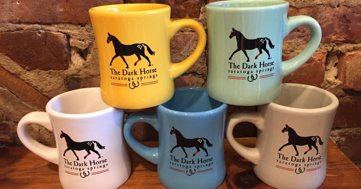 five colored mugs with the dark horse saratoga springs words and logo