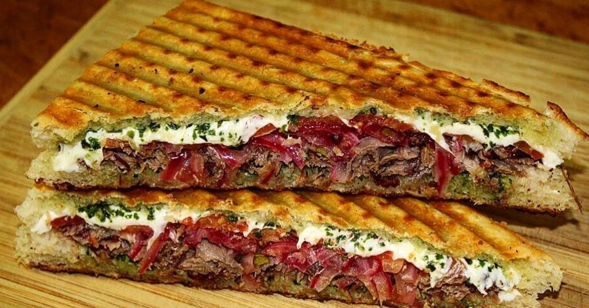 two halves of a brisket panini