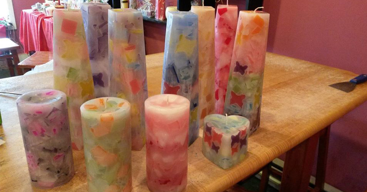 group of homemade candles on a table