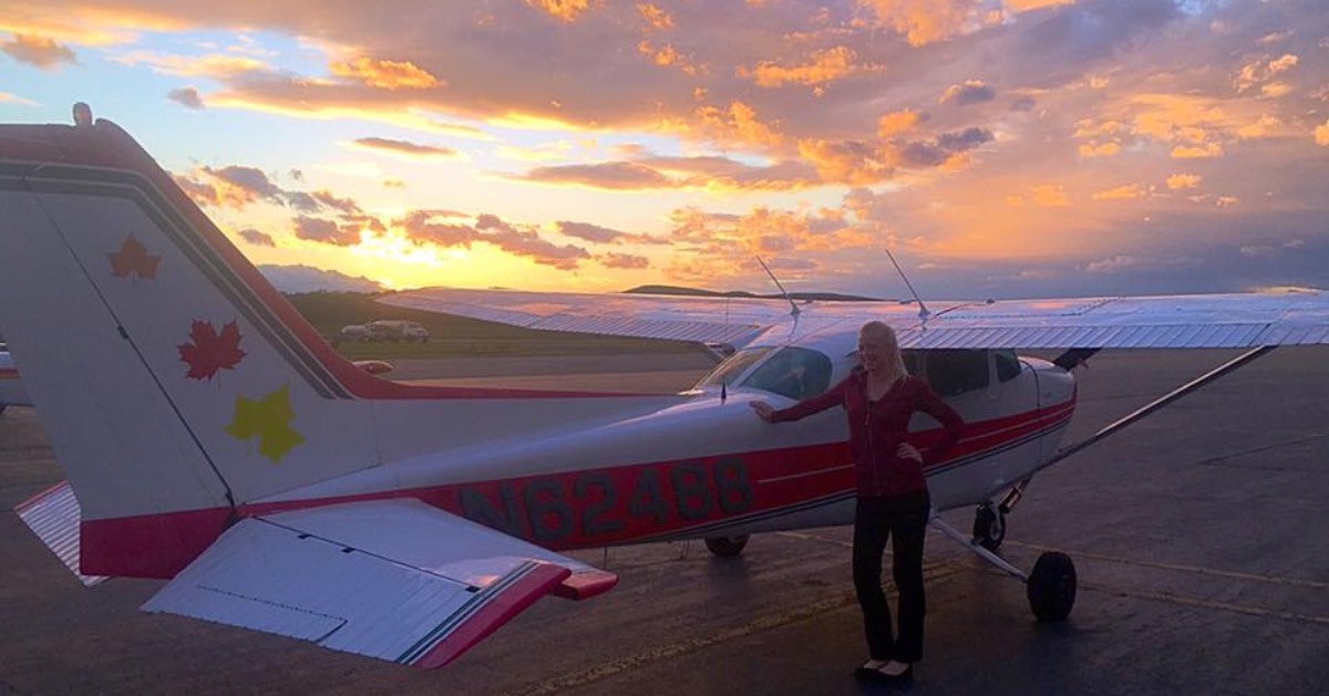 a pilot, small plane and sunset view