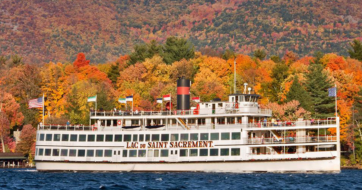 cruise ship by fall foliage