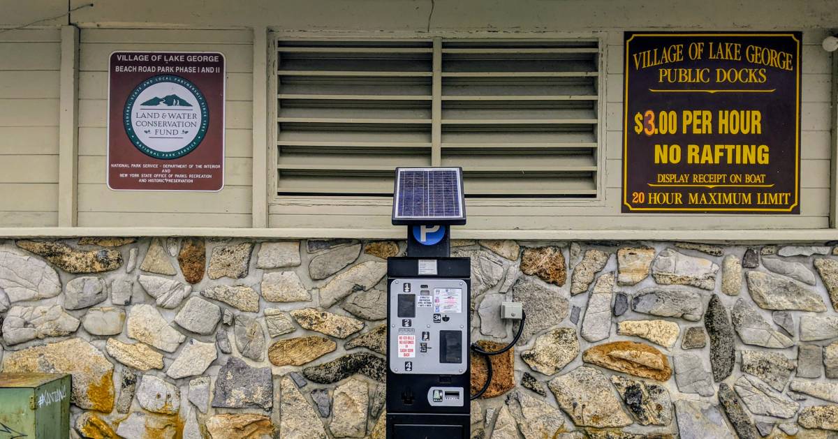 Village dock parking sign and parking meter