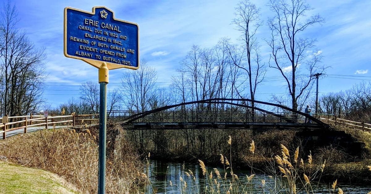 Erie Canal sign by bridge