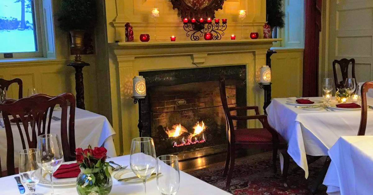 fireplace in dining room with Valentine's Day decorations