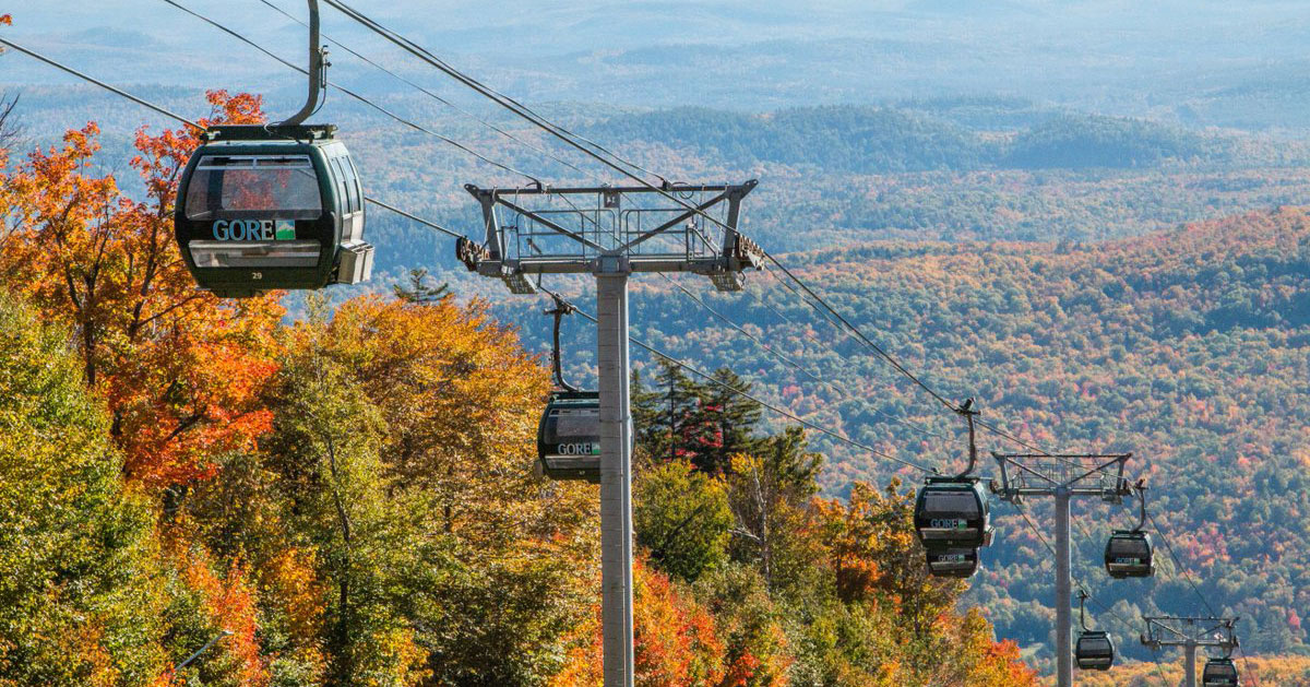 Gondolas ascending Gore Mountain in autumn