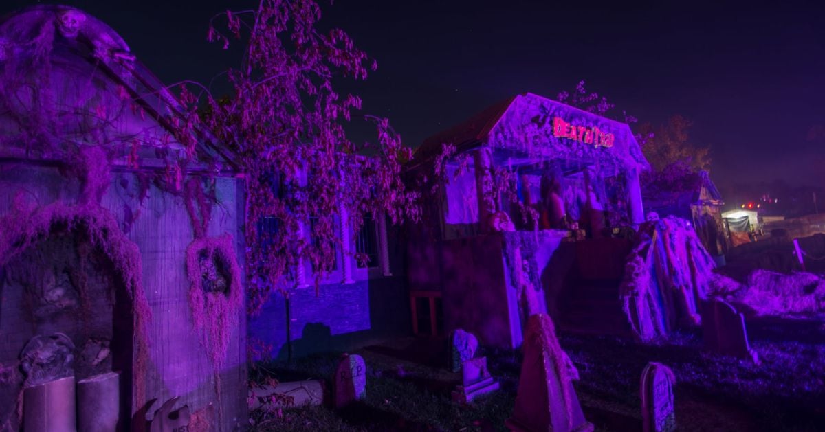 haunted graveyard with purple lighting