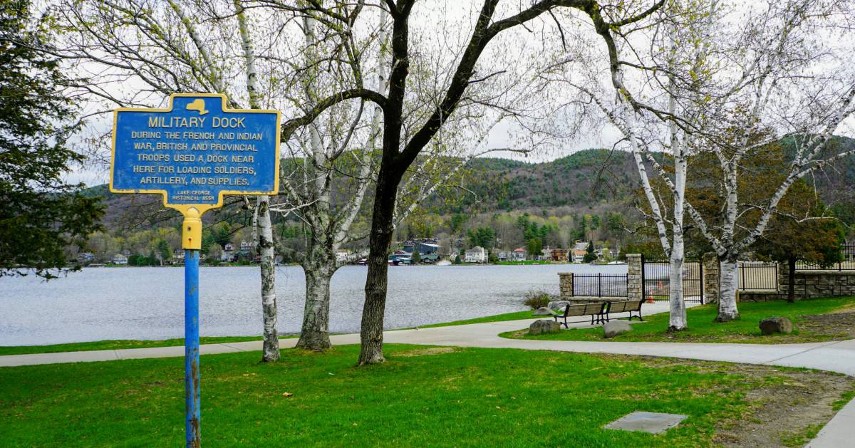 Military Dock sign and walkway by lake