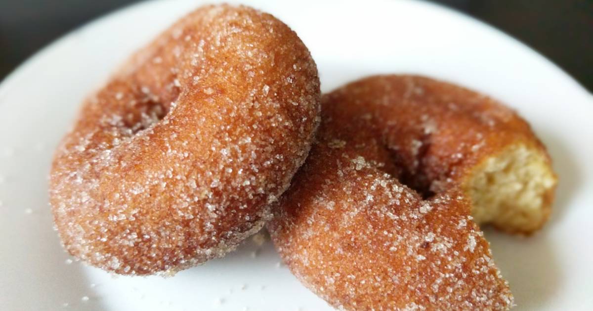 two cider doughnuts on a plate