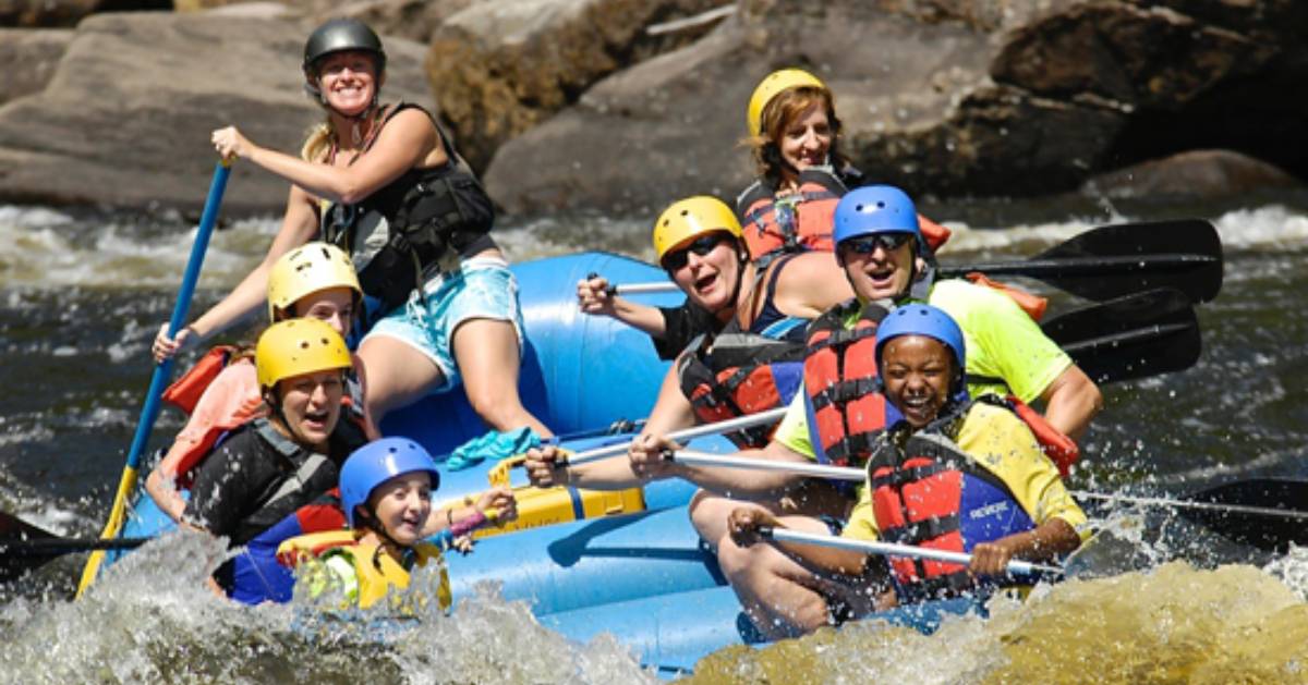 group of people whitewater rafting