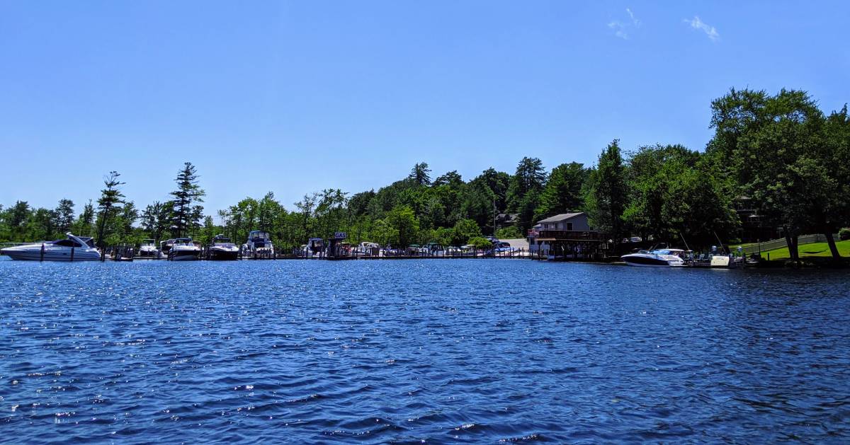 view of lake and mountains from a deck