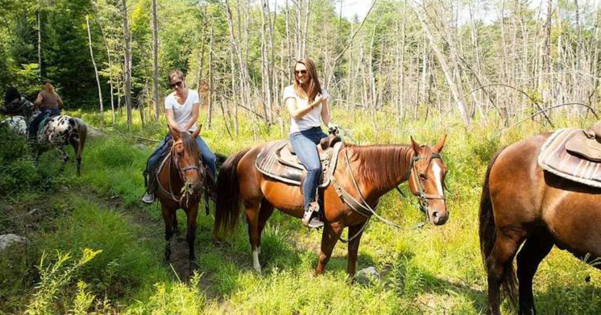 two women on a riding trail