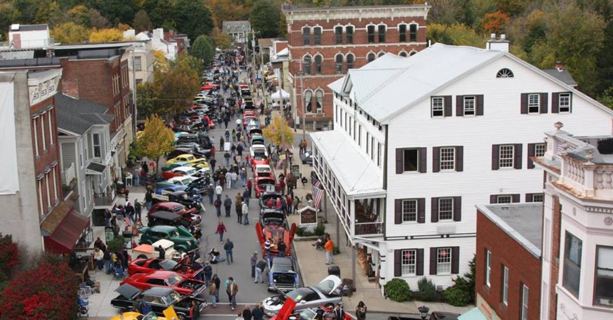 aerial view of a car show in a downtown street