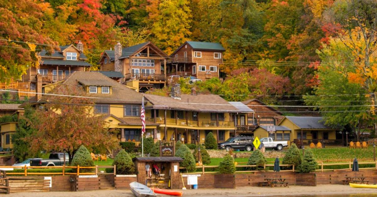 view of Trout House Village Resort in the fall from the water