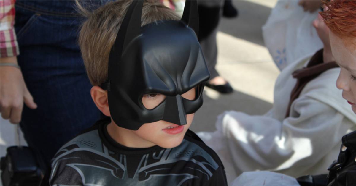 a kid dressed up as Batman