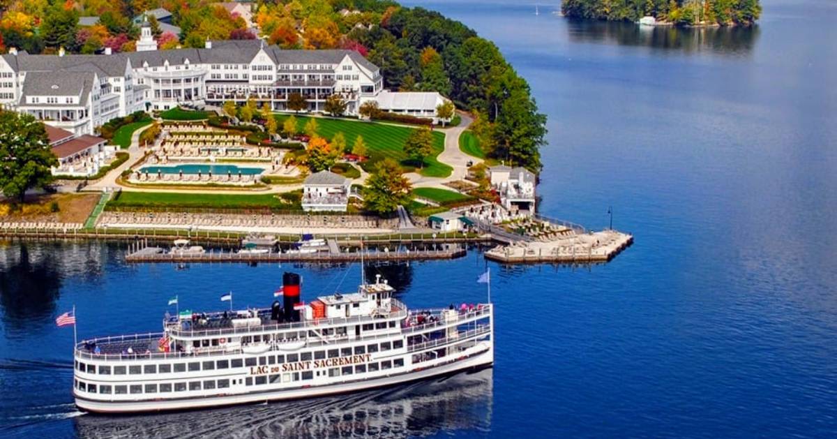 cruise ship on water in fall