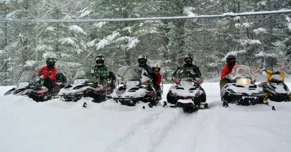 snowmobilers in a row