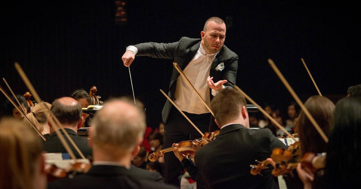 conductor conducting orchestra